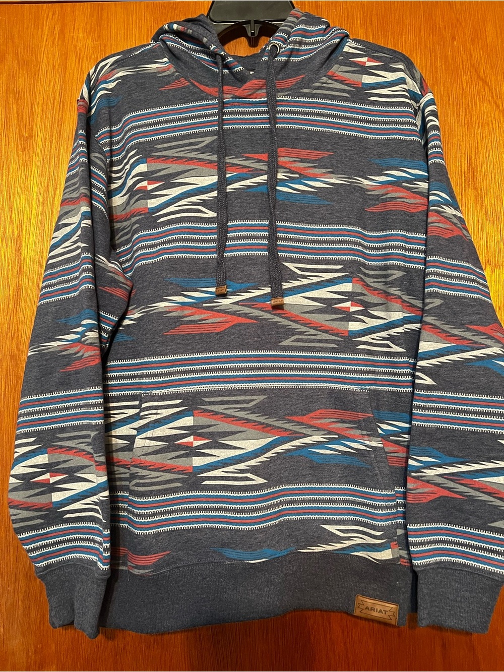 Ariat Women’s  Navy Hooded Pullover with Red, Blue, White Aztec Stripe